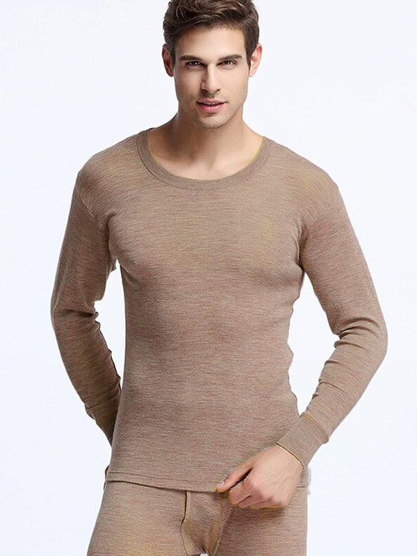 Model wearing Warm Men's 100% Merino Wool Thermal Underwear Set, SF1060, showcasing long sleeve top and pants for winter comfort.